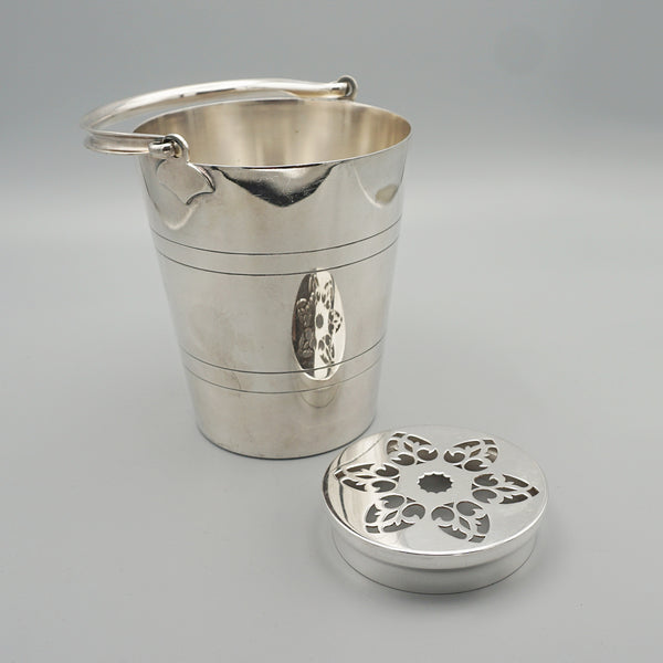 An Art Deco silver plated ice bucket by Suckling &amp; Co with original strainer. In excellent condition