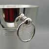 An Art Deco silver plated champagne bucket with ring handles