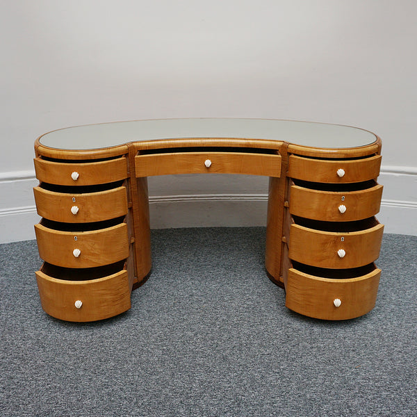 An Art Deco Desk by Betty Joel. Satin birch veneered with macassar ebony banding to base. Glass mirrored top with original ivory hand carved shell handles. 1930 dressing table, art deco desk - Jeroen Markies Art Deco