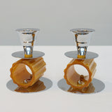 A pair of Art Deco style candlesticks. Amber bakelite, chrome. Jeroen Markies Art Deco