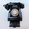 An original GPO telephone in black bakelite. With integral drawer.