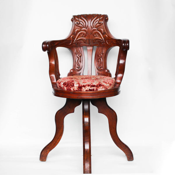 A solid, carved, walnut bar chair from HMHS Britannic, sister ship to the Titanic at Jeroen Markies.