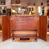 An Art Deco, walnut veneer sideboard by Harry & Lou Epstein at Jeroen Markies