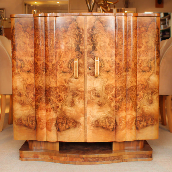 An Art Deco, walnut veneer sideboard by Harry & Lou Epstein at Jeroen Markies
