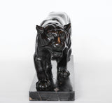 An Art Deco, patinated bronze study of a prowling tiger, set over an integral marble base. Signed to marble at Jeroen Markies