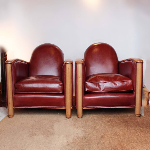 Art Deco tub chairs with fruit wood arms upholstered in chestnut leather at Jeroen Markies
