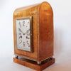 An Art Deco mantel clock in amboyna with metal face circa 1930 at Jeroen Markies 