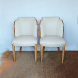 A pair of Art Deco cloud back chairs by Harry & Lou Epstein