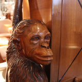 An unusual and unique Art Deco cocktail cabinet with hand carved monkeys