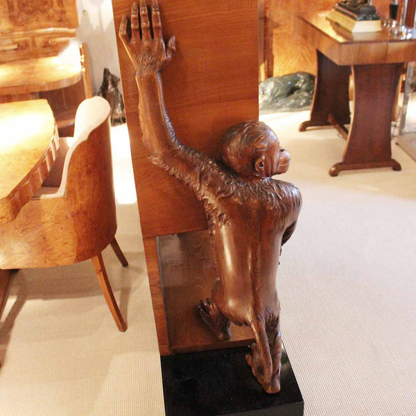 An unusual and unique Art Deco cocktail cabinet with hand carved monkeys