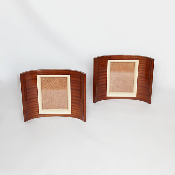 A pair of Art Deco curved wooden frames circa 1935