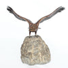 A bronze study of an eagle about to take flight with its wings outspread on the edge of a naturalistic rocky outcrop with excellent colour and fine hand finished detail. Signed with the Bergman ‘B’ to underside of tail at Jeroen Markies.