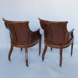 A Pair of Edwardian Armchairs Re-Upholstered in chestnut leather - Jeroen Markies Art Deco