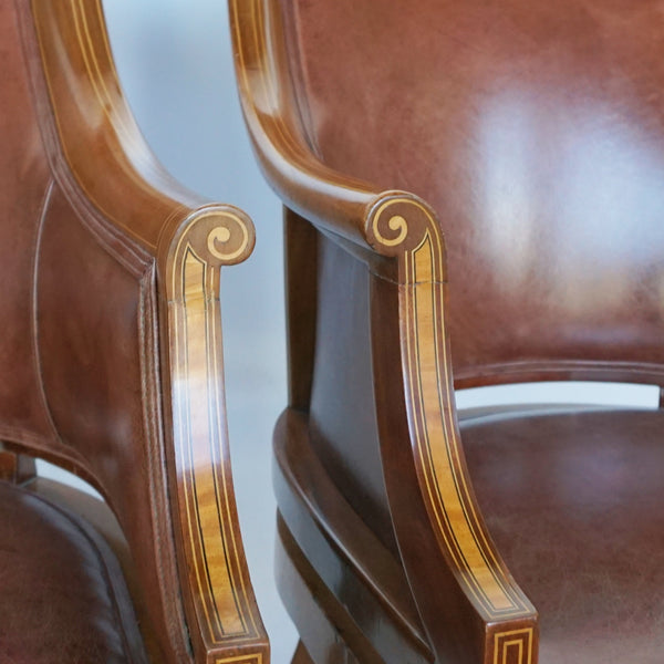 A Pair of Edwardian Armchairs Re-Upholstered in chestnut leather - Jeroen Markies Art Deco