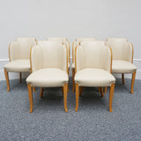 Art Deco cloud backed armchairs upholstered in cream leather by Harry & Lou Epstein. 