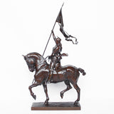 Jeanne d'Arc. A stunning early salon version of the famous Joan of Arc in the Place des Pyramides in Paris. Wonderful rich brown patina and stunning hand chased detail and characterisation. Set on an integral, naturalistic plinth. Signed E Fremiet to cast at Jeroen Markies