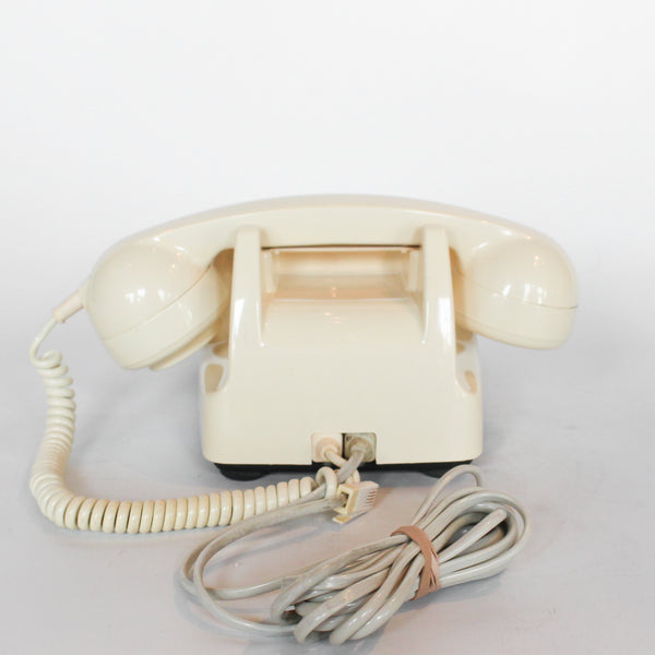 An original GPO model 706 telephone in cream at Jeroen Markies