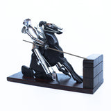 Don Quixote Bookends. Walnut and silver-plated metal in the style of Hagenauer