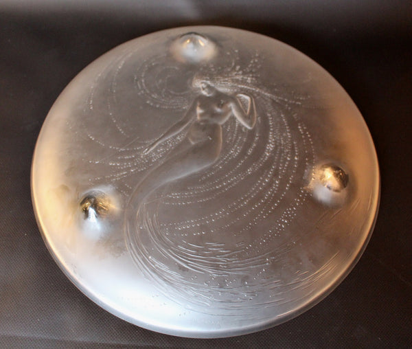 Sirene Coupe  an Art Deco ‘trepied’ glass coupe by Lalique Glass of frosted glass with raised opalescent design in the form of a mermaid frolicking in swirling waters set on three raised feet.