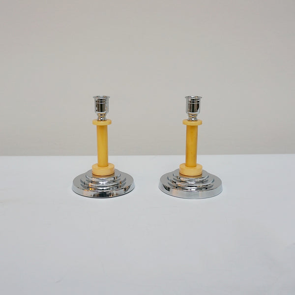 A pair of Art Deco candlesticks. Yellow bakelite stem with dual bakelite rings. Jeroen Markies Art Deco